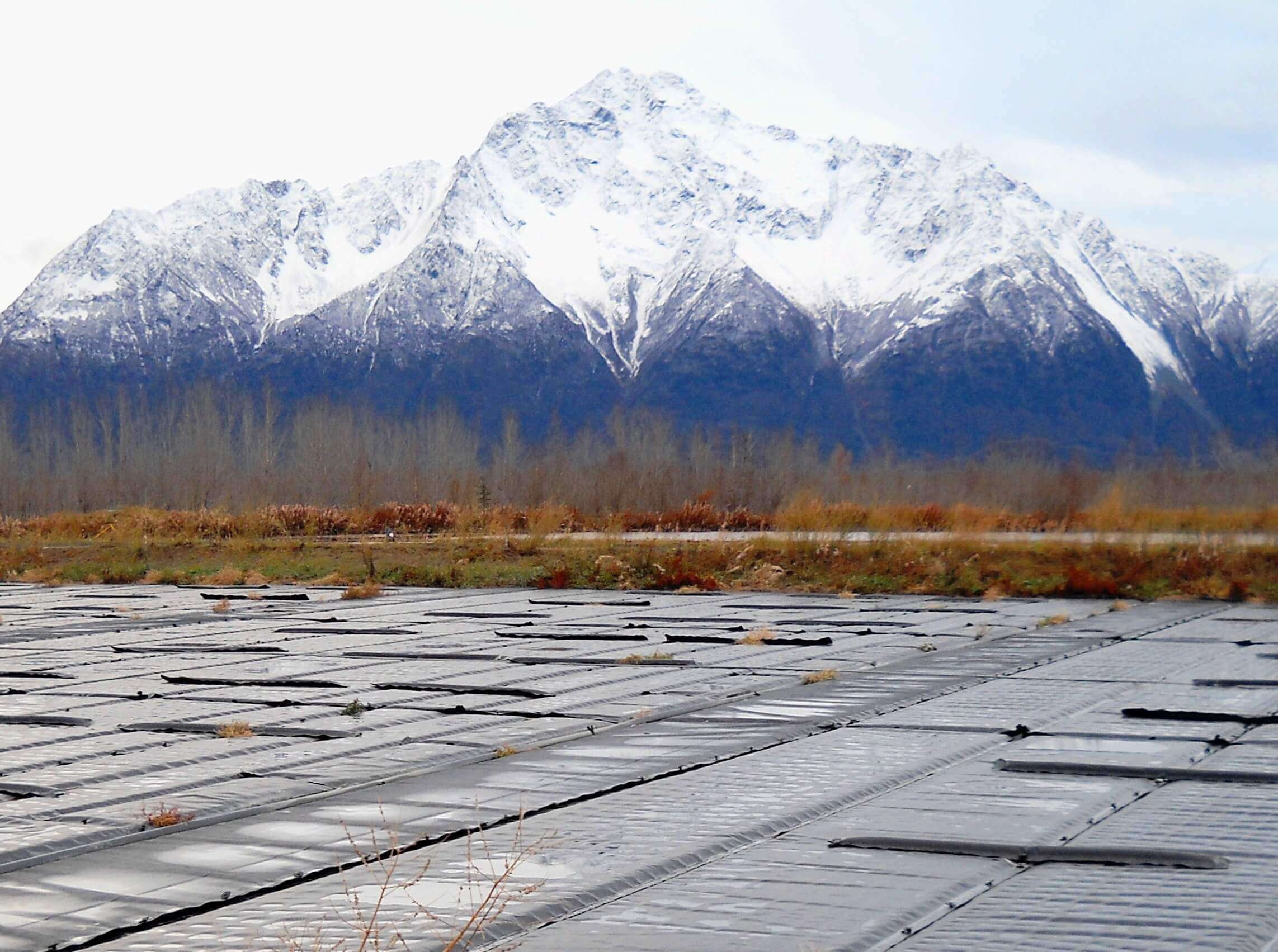 Water treatment with mountain backdrop