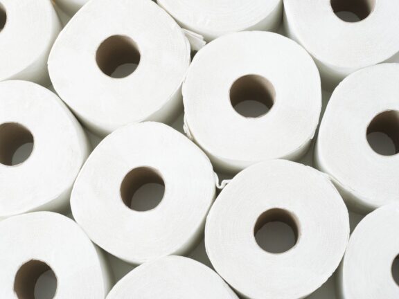 Top view of twelve rolls of toilet paper